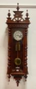 A Late Victorian Vienna style regulator wall clock, the ivorine dial with Roman chapter ring and