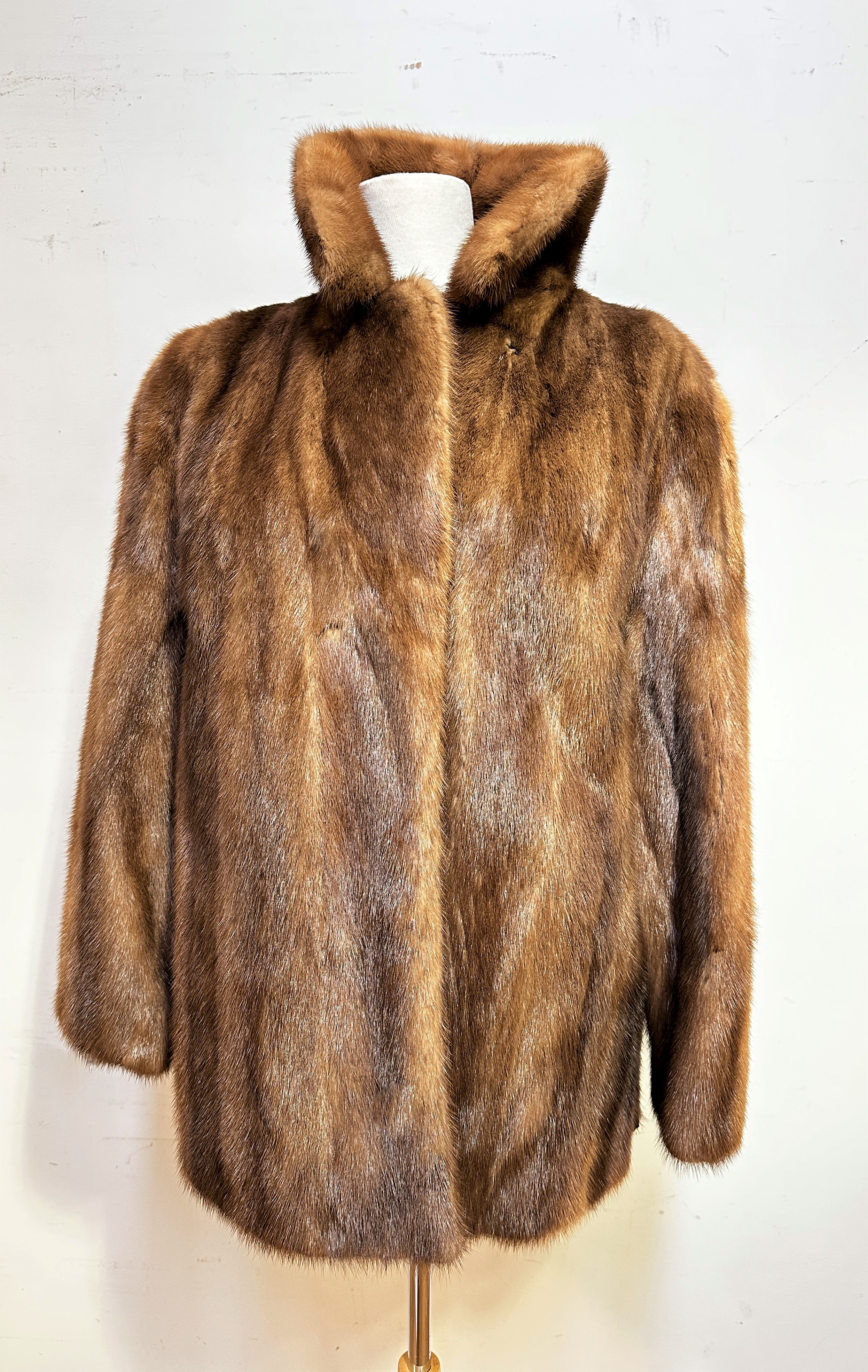 A lady's Jenner's of Edinburgh mink jacket with collar and slash pockets to side, satinised interior