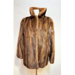 A lady's Jenner's of Edinburgh mink jacket with collar and slash pockets to side, satinised interior