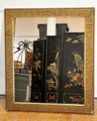 An Edwardian rectangular gilt framed mirror with beaded and daisy pattern floral border, (internal