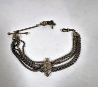 A silver Edwardian Albert with centre chased oval bead surmounted panel with five various fancy link