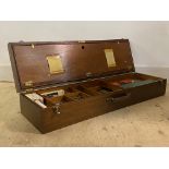 A large mahogany draftsman box, the hinged lid revealing interior fitted with sliding lift out