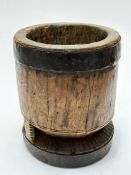 African Tribal Art:- An African, possibly Nigerian, treen carved meal, of cylinder form with tapered