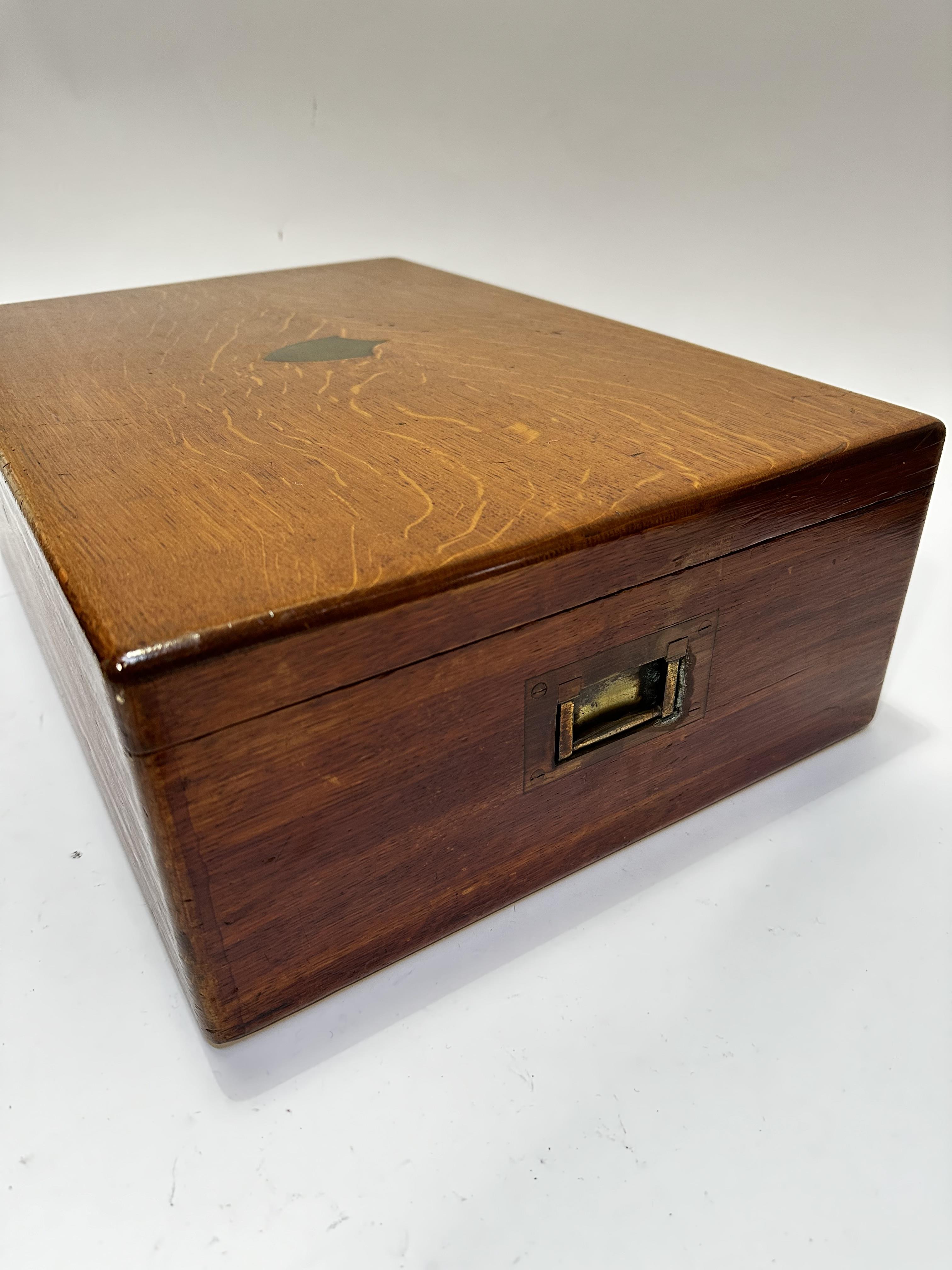 An Edwardian oak table canteen box, with shield set brass inset plaque to top and recessed brass - Image 2 of 6