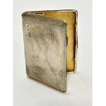 An Edwardian Birmingham silver engine turned decorated cigarette case with engraved initials PAA and