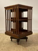 A fine Edwardian mahogany two tier revolving bookcase, the satinwood cross banded and boxwood and