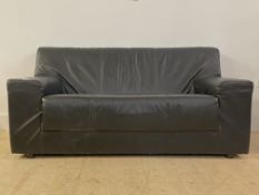 A contemporary black leather upholstered two seat sofa H71cm, L147cm, D86cm
