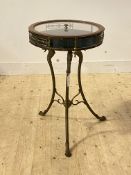 A table vitrine, the circular drum top with lift off perspex inset lid standing on three dragon cast