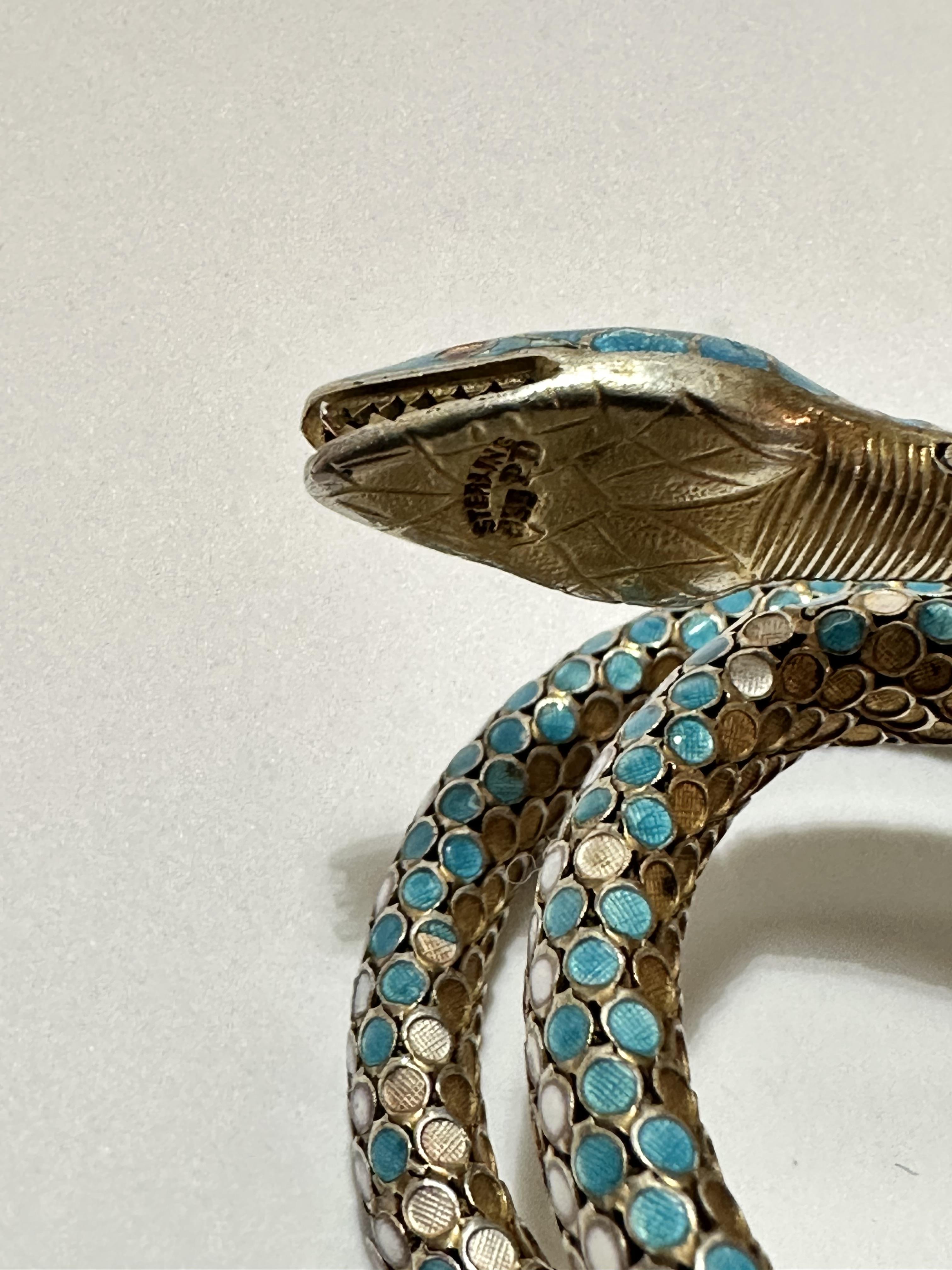 An Eastern silver gilt enamelled serpent triple coil bracelet with open mouth and inset enamelled - Image 4 of 5