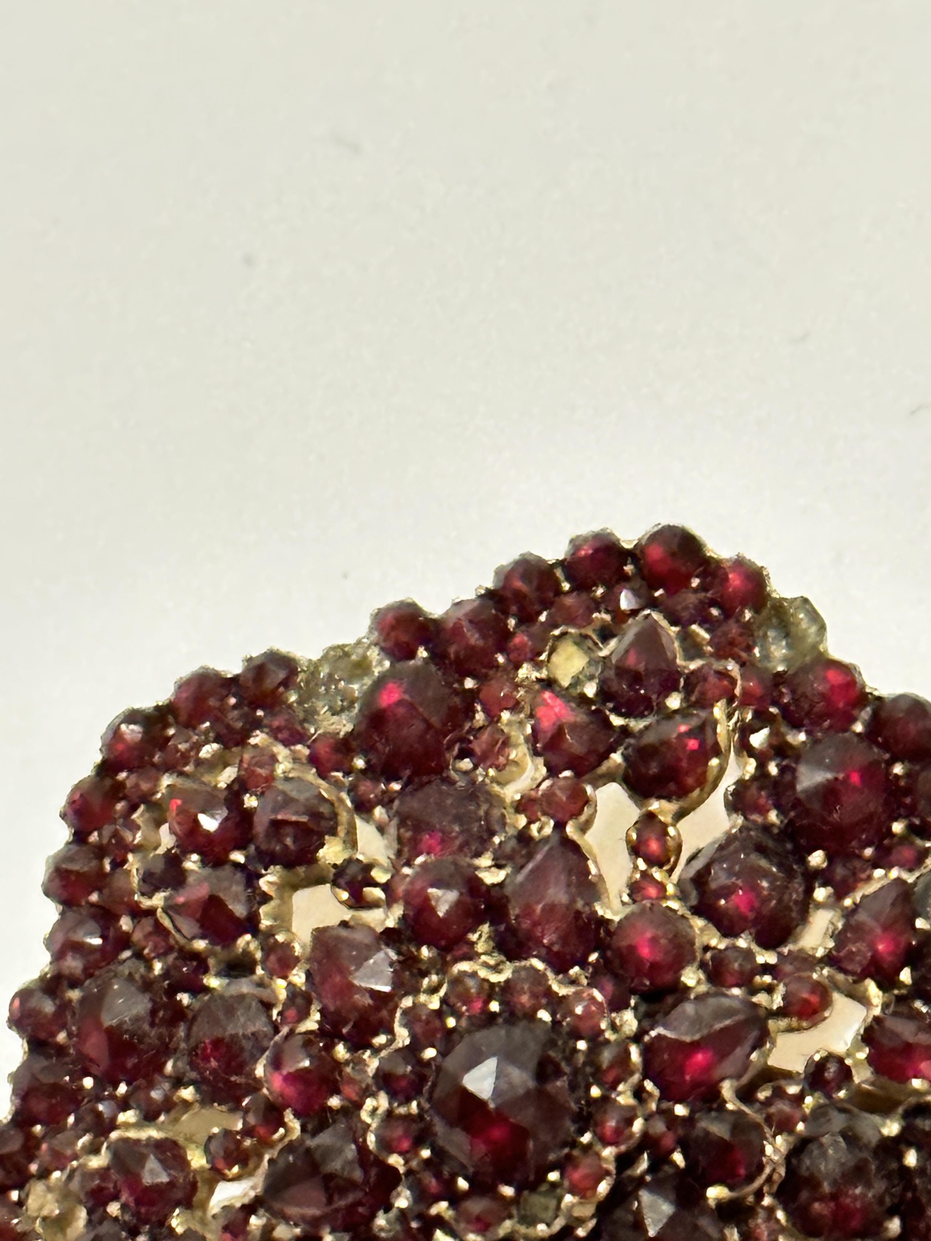 A late 19th early 20thc garnet cluster brooch with centre cluster and swags with drops, some - Image 3 of 5