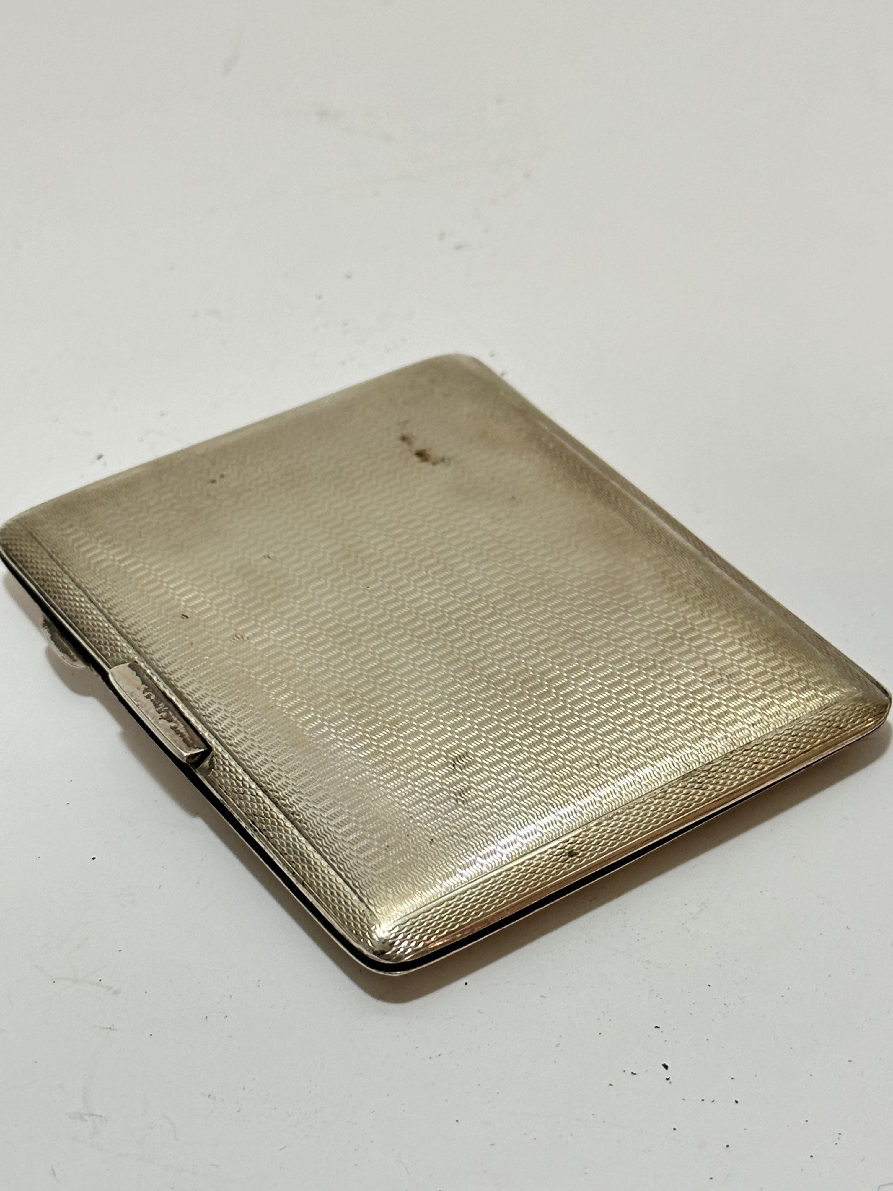 An Edwardian Birmingham silver engine turned decorated cigarette case with engraved initials PAA and - Image 3 of 3