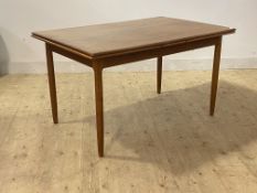 AM Mober, A Danish mid century vintage teak dining table, the rectangular top with duo drawer leaf