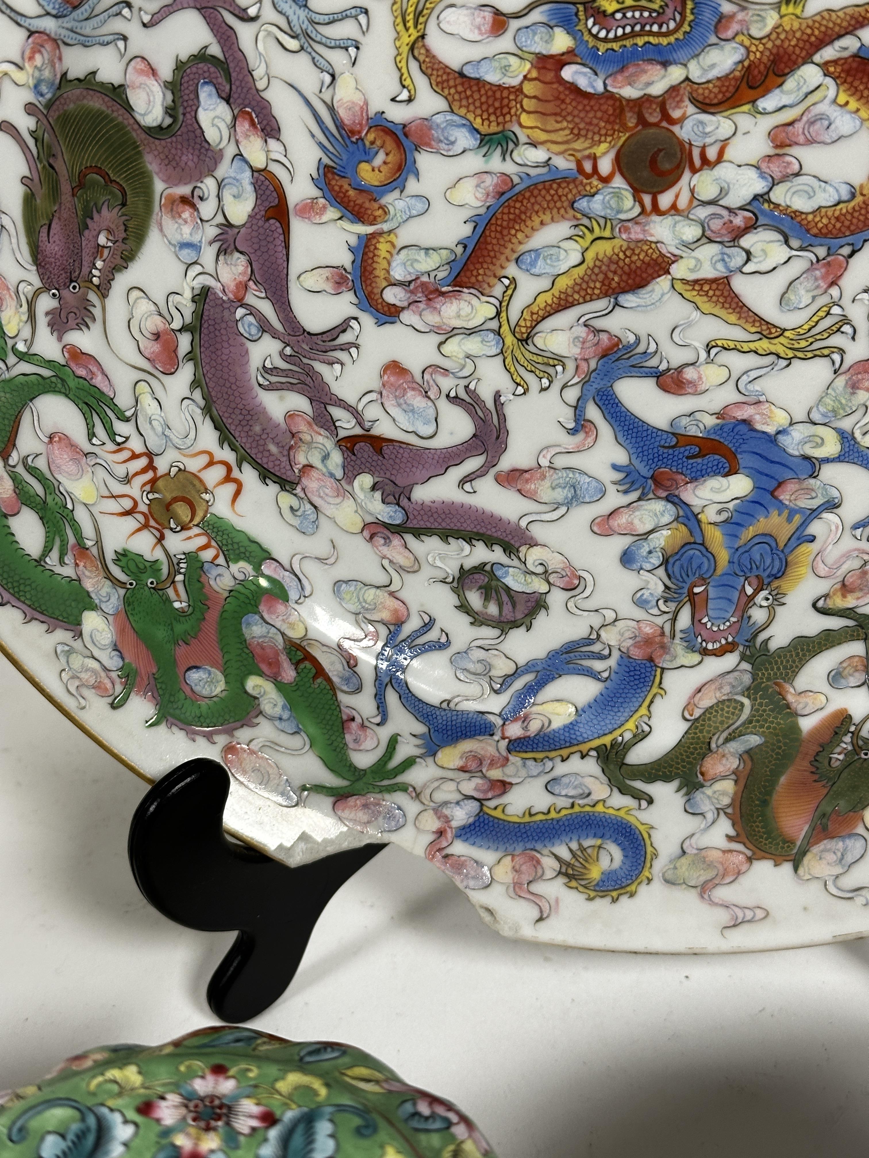 A 19thc Chinese dish decorated with four claw centre dragon enclosed within a dragon and cloud - Image 2 of 19