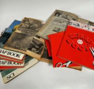 A collection of scrap books with newspaper cuttings from WWII to 1970s and 1980s, some with