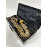 A Buesener Aristocrat 200 alto brass and chrome plated saxophone complete with mouthpiece and fitted