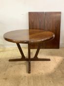 Interform Collection, a mid century Danish Brazilian rosewood extending dining table, the top with