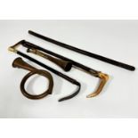 Two leather bound horn handled riding crops, one with silver mount and the other plated, (