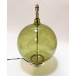 A green bulbous glass table lamp with chrome mounted circular base and fitting (including light 54cm