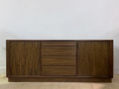 Interform collection, A mid century Danish brazillian rosewood sideboard of rectangular outline,