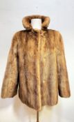 A John Logan of Glasgow lady's light ranch mink jacket complete with collar and slash pocket (L