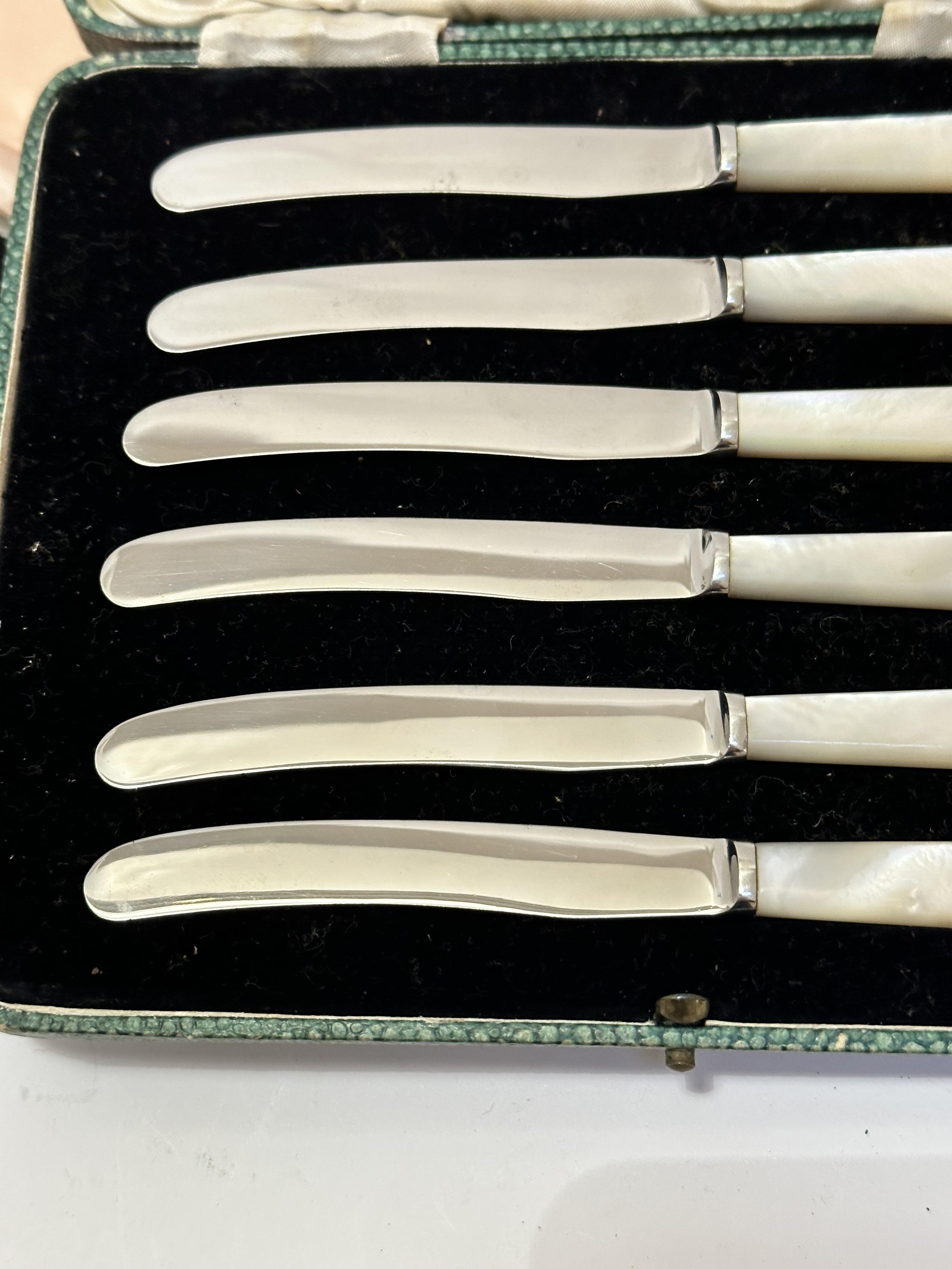 A set of six Glasgow silver Celtic style knot handled coffee spoons, complete with original fitted - Image 3 of 4