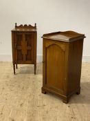 An Edwardian mahogany bedside table, the galleried top over single door enclosing shelf, raised on