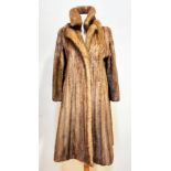 A lady's West End Furriers Haymarket Terrace Edinburgh full length mink coat with separate lapels