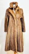 A lady's West End Furriers Haymarket Terrace Edinburgh full length mink coat with separate lapels