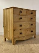 A Victorian pine chest, fitted with two short and three long graduated drawers over shaped apron and