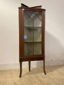 An Edwardian boxwood stung mahogany corner display cabinet, astragal glazed door enclosing two