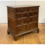 A 19th century William and Mary style oak two part chest, the rectangular top with moulded edge over