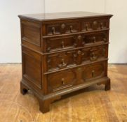 A 19th century William and Mary style oak two part chest, the rectangular top with moulded edge over