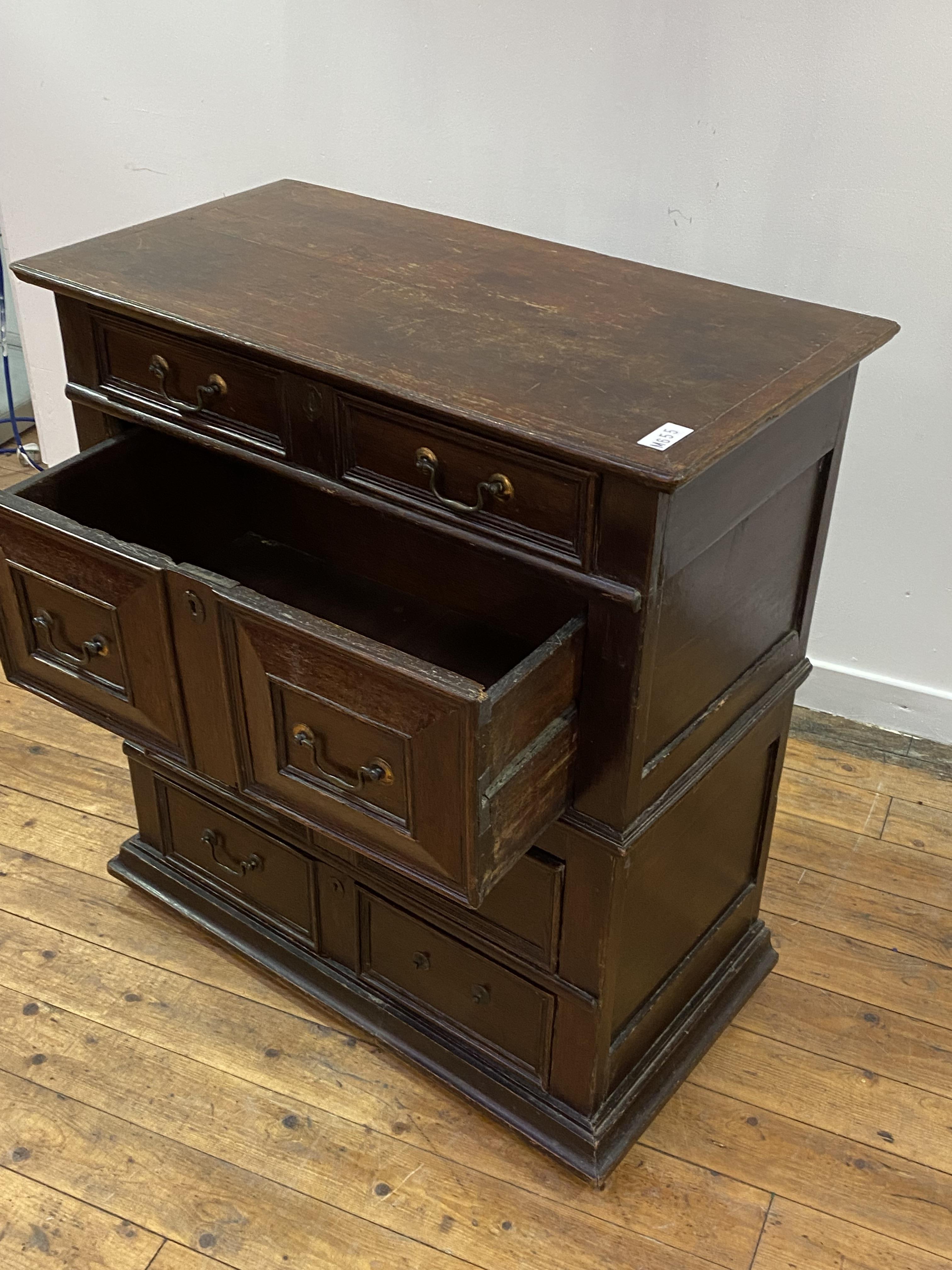 An oak chest of drawers, early 17th century and later, the top with moulded edge over four panel - Image 3 of 3