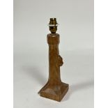 Workshop of Robert Mouseman Thompson, an oak table lamp, on a square base, with carved mouse