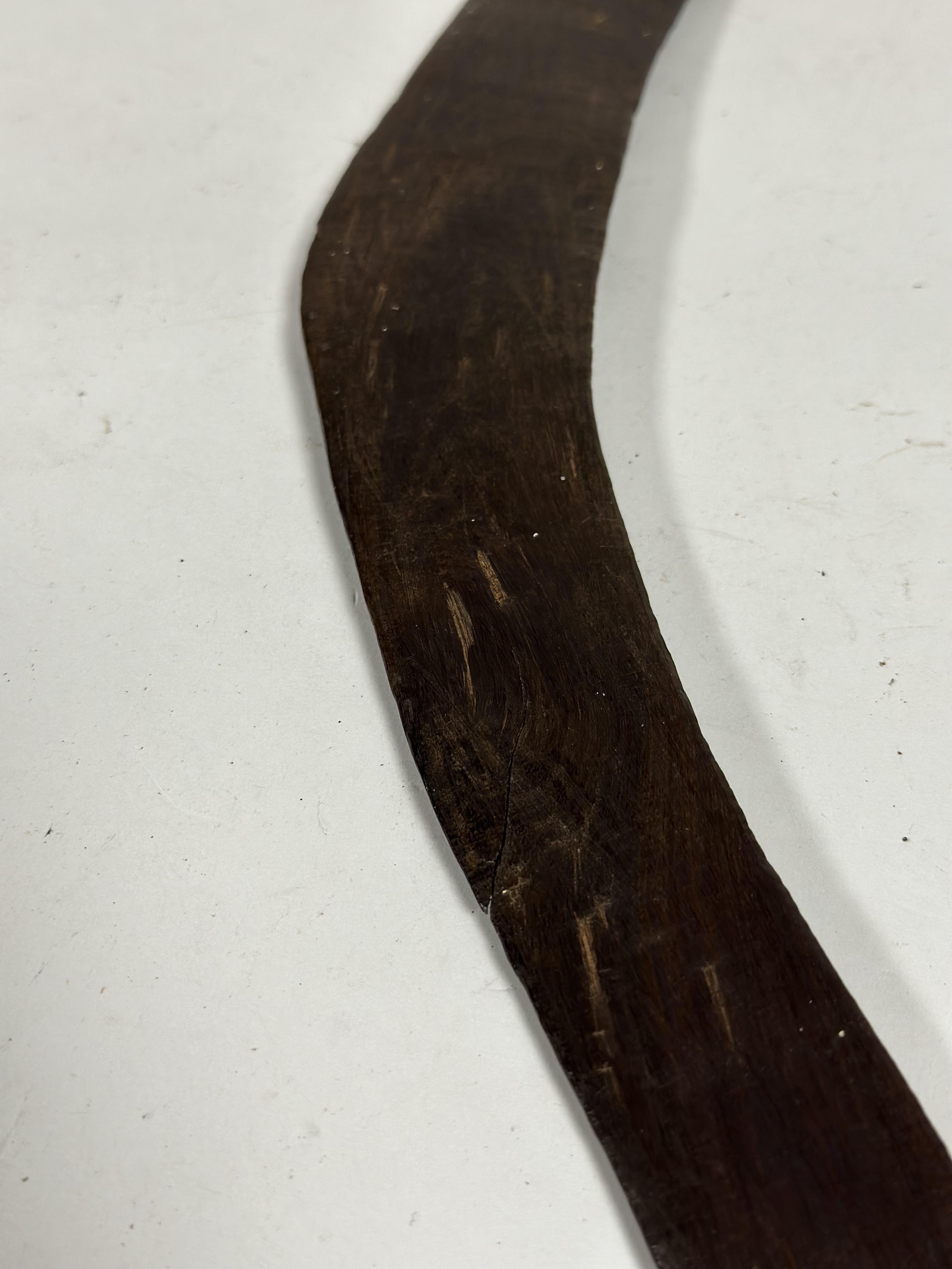 An Aboriginal boomerang, decorated with zoomorphic and other designs to one side, the reverse with - Image 3 of 3