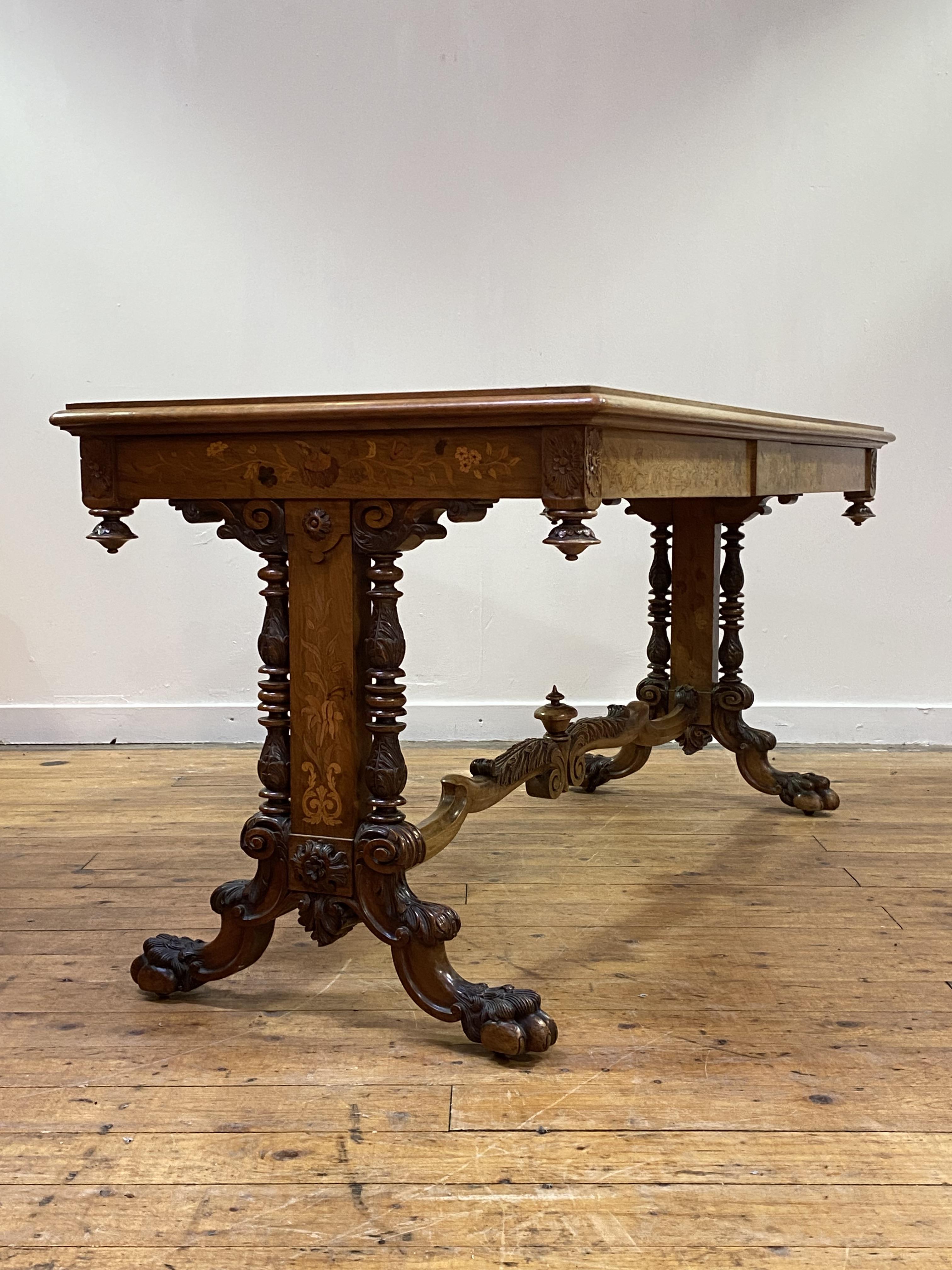 A fine Dutch walnut library table, 19th century, the cross banded top with radial circular and - Image 2 of 5