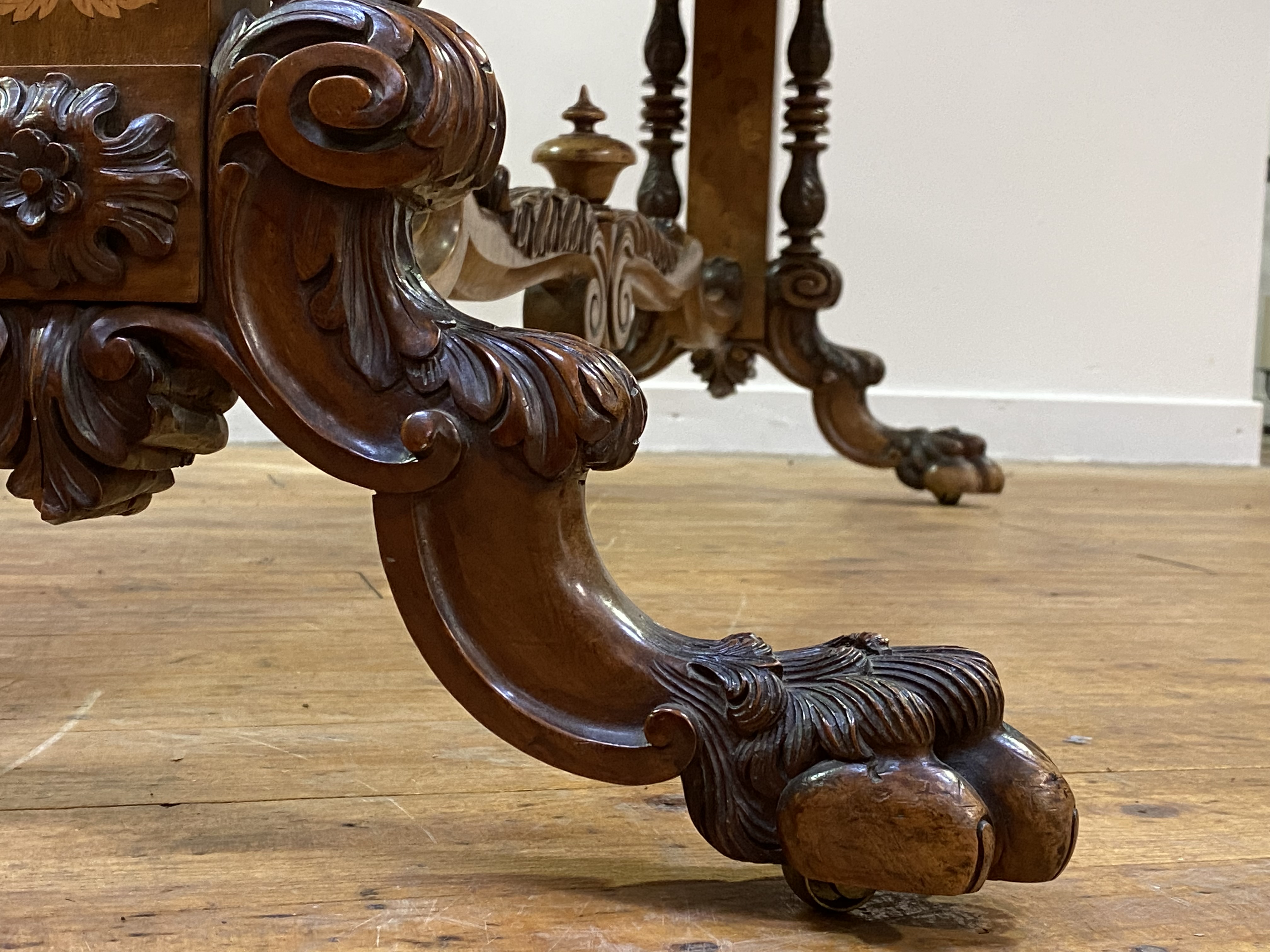 A fine Dutch walnut library table, 19th century, the cross banded top with radial circular and - Image 4 of 5