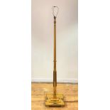 A parcel gilt and lacquered chinoiserie floor lamp, circa 1920, the square tapered and chamfered