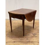 A George III Sheraton style mahogany Pembroke table, the oval satinwood cross banded top with