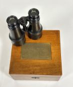 A pair of 19th century French binoculars, in a mahogany case with internal label "Iseli