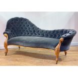 A Victorian walnut framed chaise longue, circa 1860-70, the serpentine crest rail and back rest