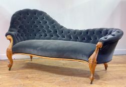 A Victorian walnut framed chaise longue, circa 1860-70, the serpentine crest rail and back rest