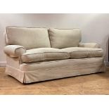 A contemporary upholstered sofa, with squab cushions, moving on castors, retailed by Whytock and
