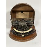A Hammond No. 2 curved keyboard type-shuttle typewriter, c. 1890-1900, with celluloid label and in
