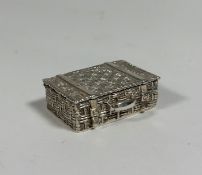 A silver pill box, modelled as a picnic basket, Hamilton & Inches, Edinburgh, 2010. 15mm by 40mm