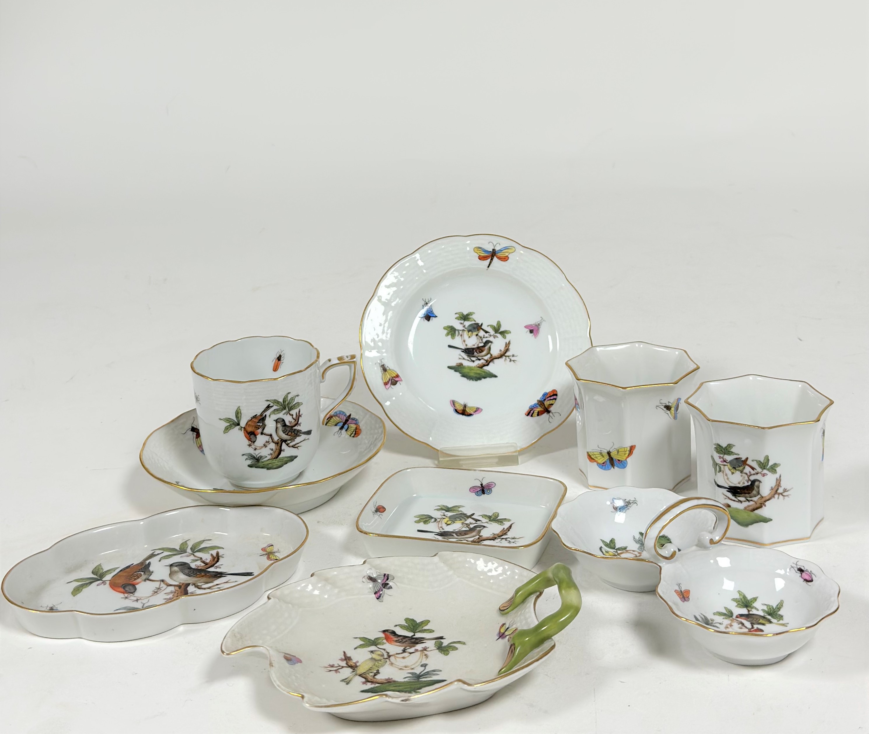 A group of Herend porcelain in the Rothschild Bird pattern comprising: a leaf-shaped dish; a twin