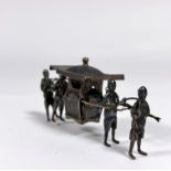 A Chinese silver model of a sedan chair with four attendants, Chong Woo, Hong Kong, c. 1900, stamped