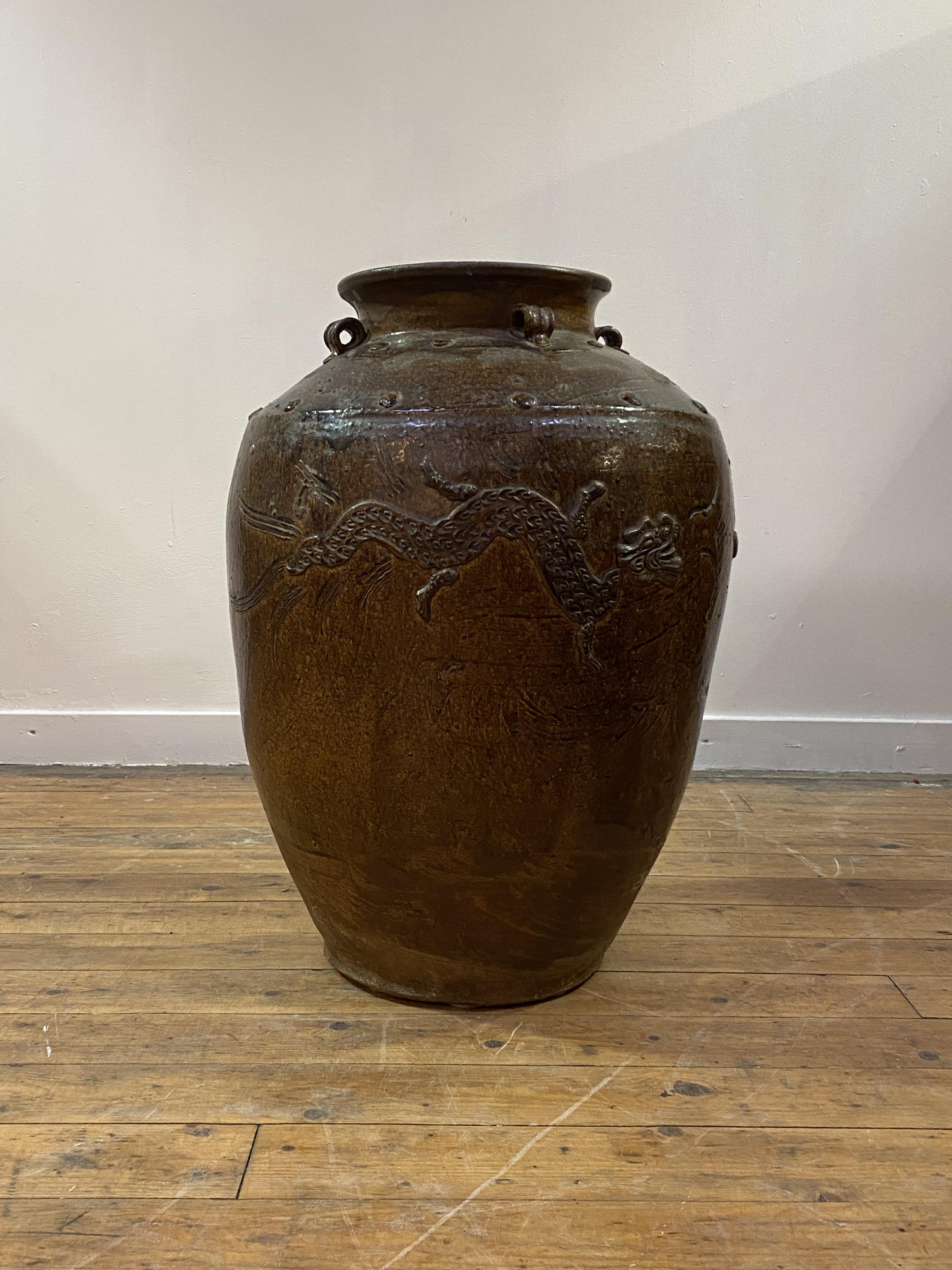 A large Chinese brown-glazed Martaban jar, probably 19th century, the tapering ovoid body - Image 2 of 4
