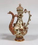 Zsolnay Pecs: a "Persian" ewer, decorated in pink and gilt, with a reticulated foot, blue printed