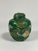 A Chinese glazed jar and cover of Wang Bing Rong type, 20th century, decorated in relief with cranes